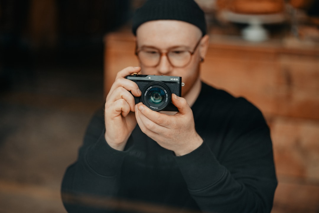 Confident street photographer in action